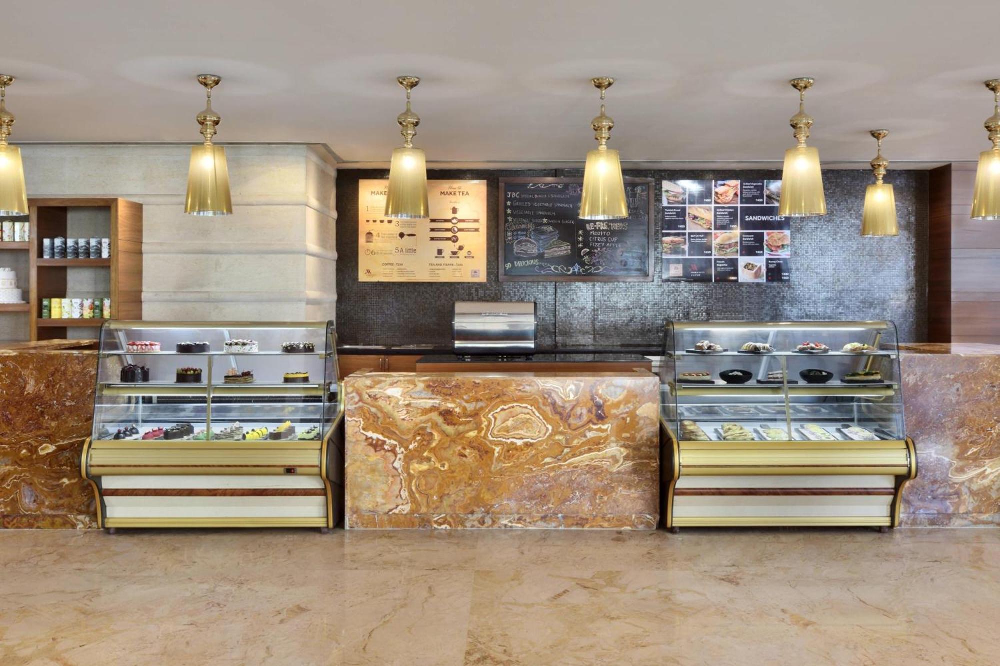 Jaipur Marriott Hotel Buitenkant foto The pastry shop